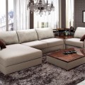 Угловой диван в интерьере маленькой гостиной – советы и фото